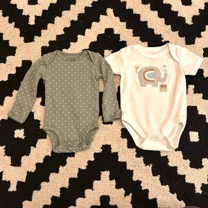 Green girls Carter’s long sleeve onesie. 
White Millie & Myles elephant onesie.